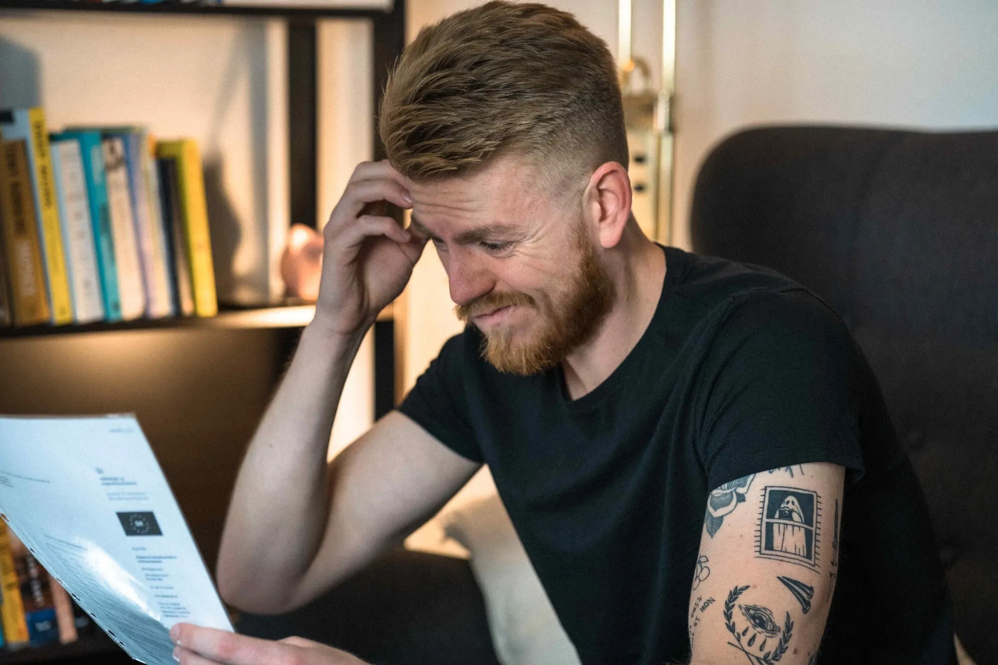 Frustrated student reading his employment contract