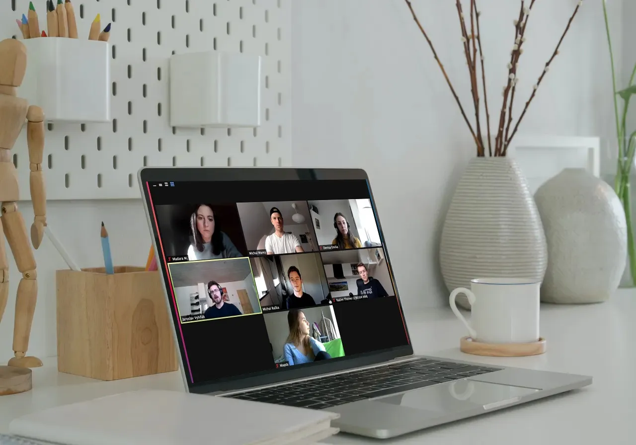 laptop screen with people in a video call